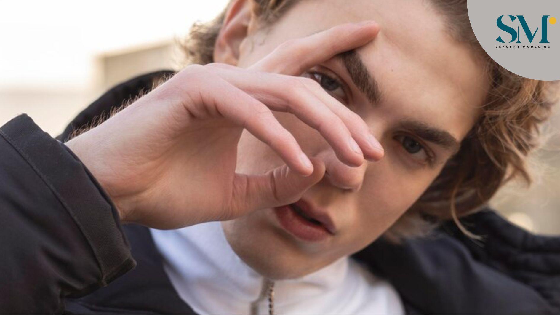 Portrait of handsome man posing outdoors