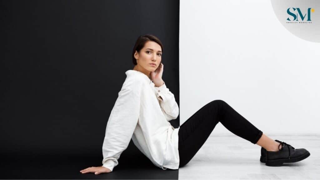Young beautiful girl sitting on floor