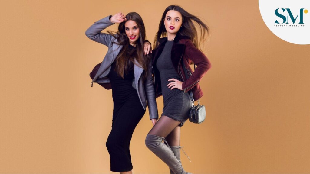 Glamorous pretty women posing and wearing casual winter jackets