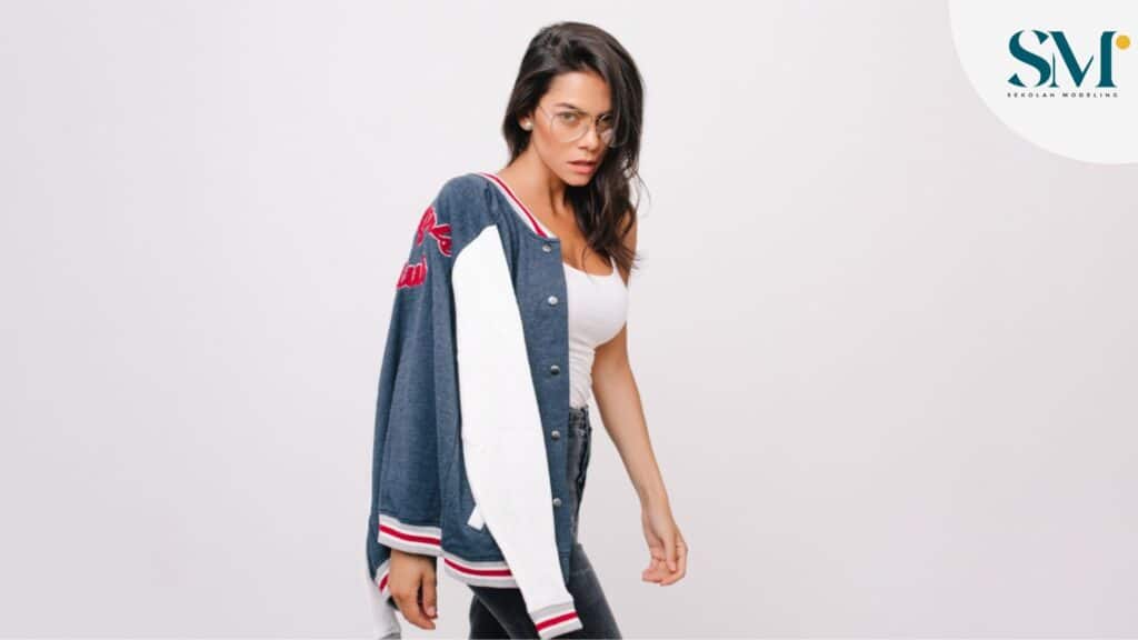 girl in stylish glasses looking with interest while posing